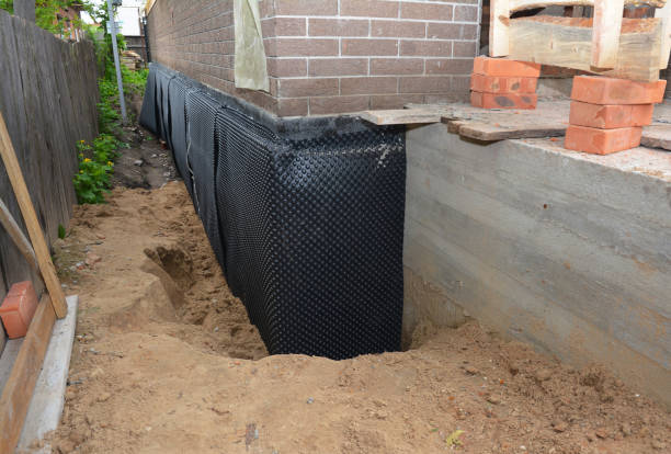 SJ Waterproofing Pros technician performing targeted Sump Pump Installation assessment in Quincy, MI